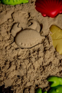 Sand and toys on table 
